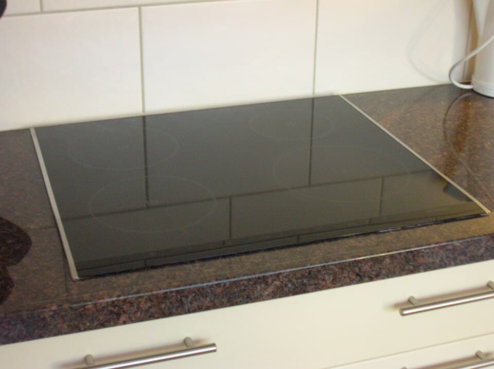 Commercial induction cooktop plate — bench-mounted cooking zone